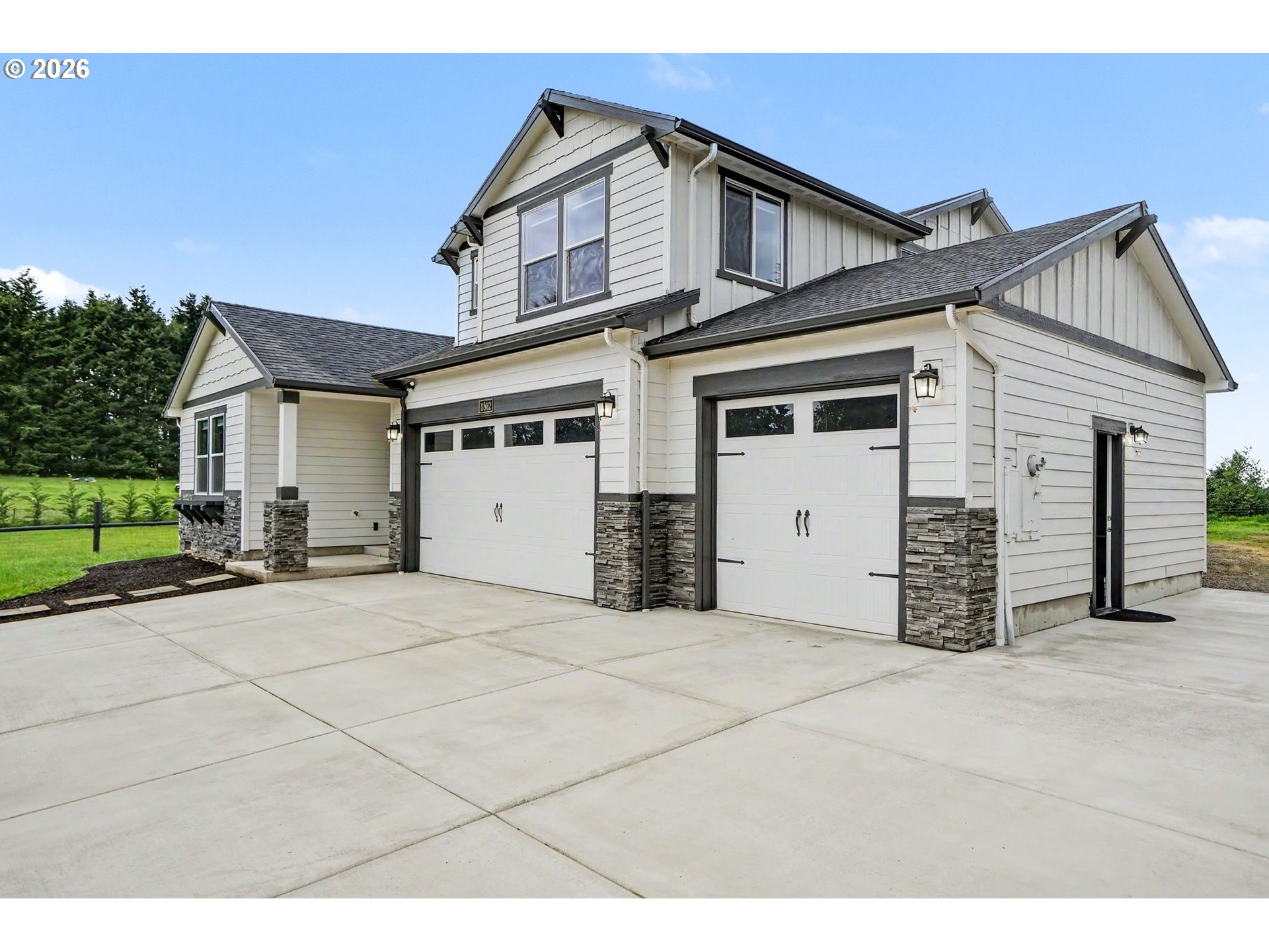 11862 Steinkamp Road Southeast Aumsville, OR 97325 - Photo 10 of 48 a view of a house with a garage
