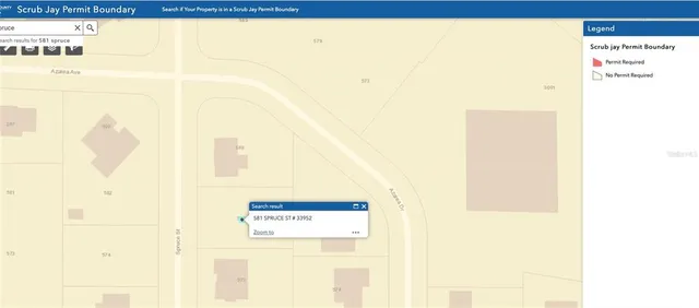 a view of entryway with wooden walls