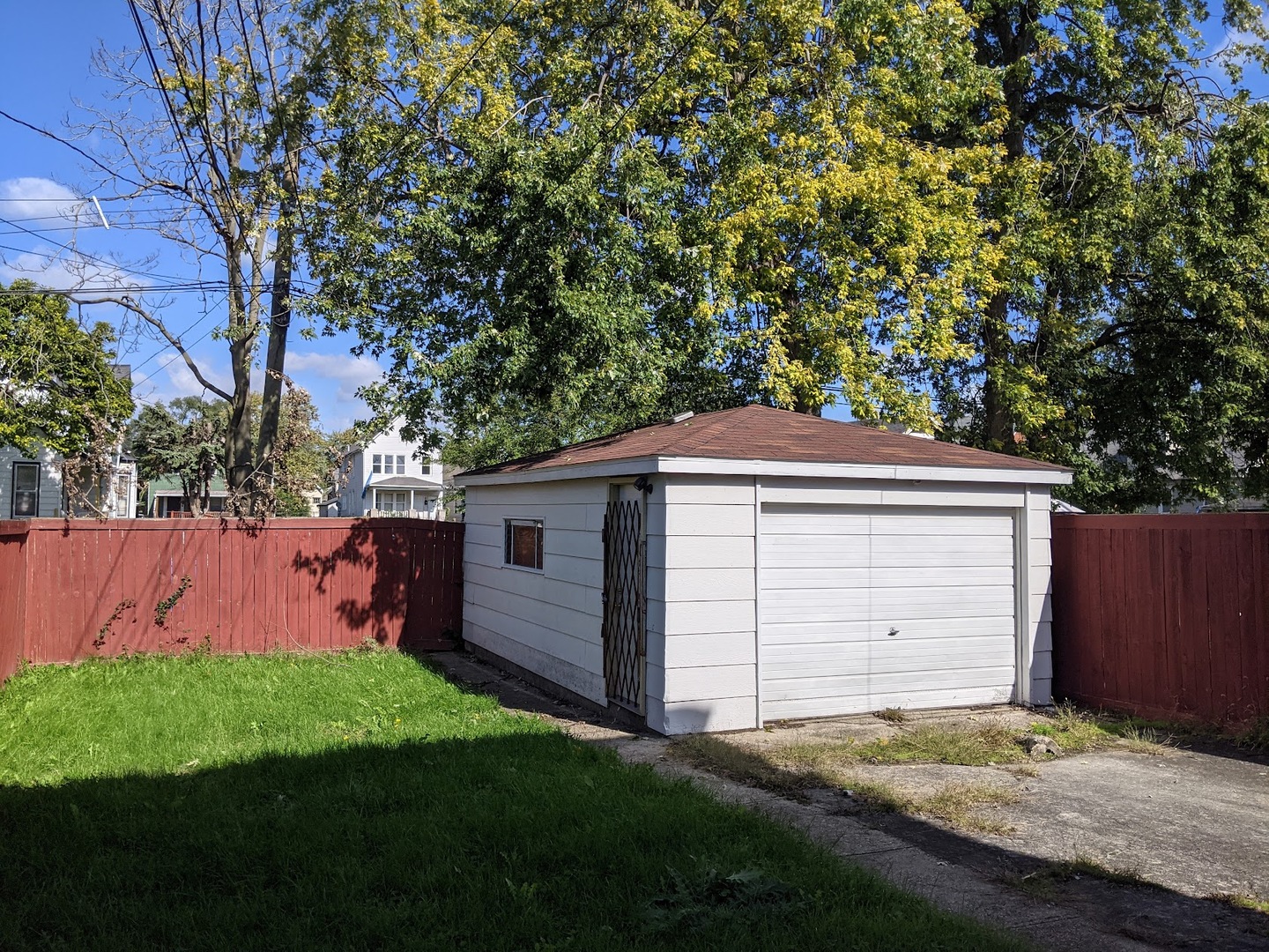324 West 112th Street Chicago, IL 60628 - Photo 16 of 17 a front view of house with yard