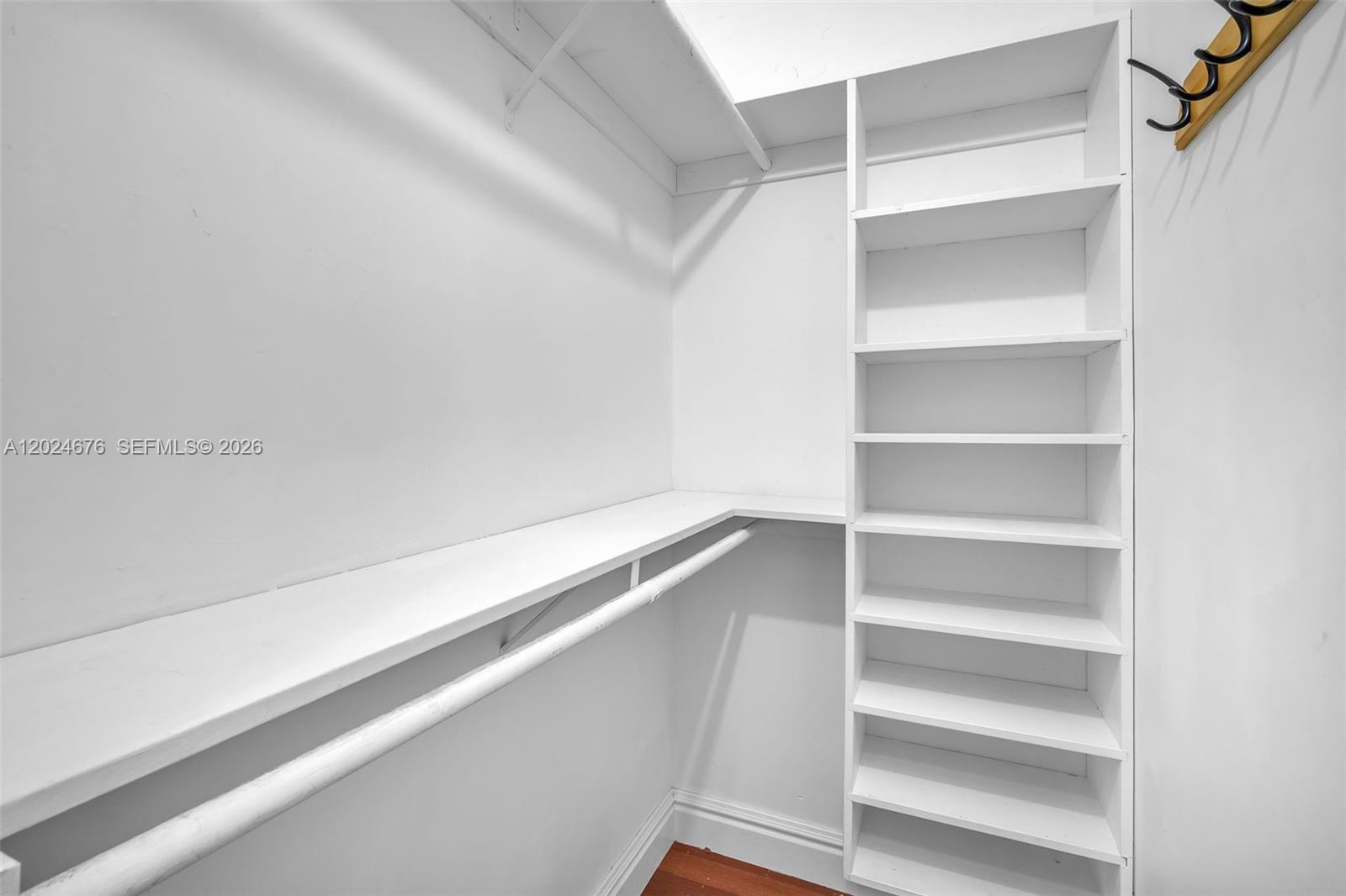 2155 Southwest 156th Court Miami, FL 33185 - Photo 45 of 57 a view of walk in closet with empty racks