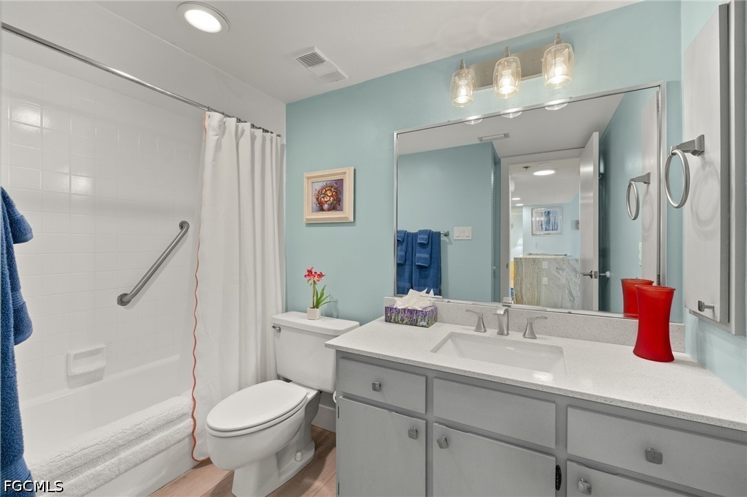 3170 Matecumbe Key Road, Unit 134 Punta Gorda, FL 33955 - Photo 25 of 31 a bathroom with a sink a toilet and shower