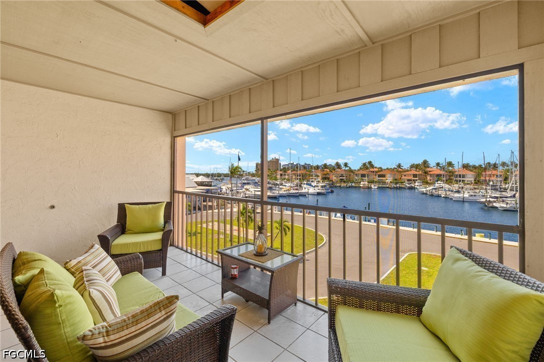 3170 Matecumbe Key Road, Unit 134 Punta Gorda, FL 33955 - Photo 27 of 31 a balcony with furniture