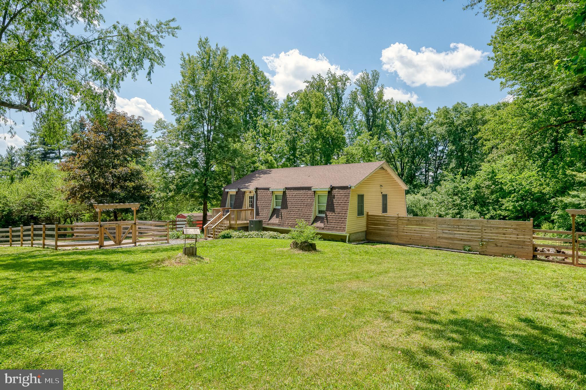 305 Crowl Road Westminster, MD 21158 - Photo 1 of 55 a view of a house with swimming pool and sitting area