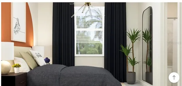 a bedroom with a bed and a large window with garden view