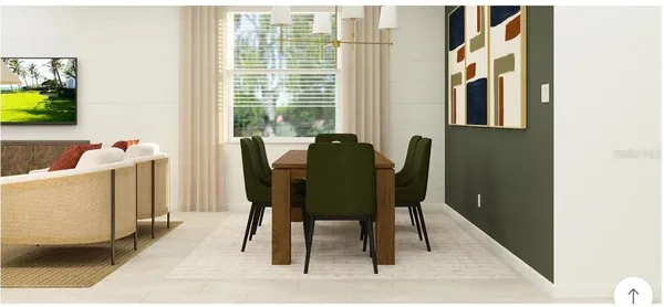 a dining room with furniture and a window