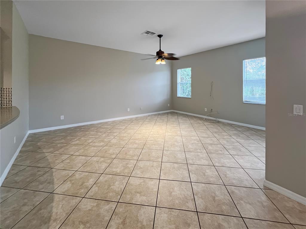 11531 Vicolo Loop Windermere, FL 34786 - Photo 15 of 32 a view of an empty room with a window