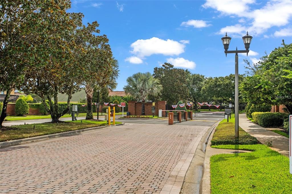 11531 Vicolo Loop Windermere, FL 34786 - Photo 20 of 32 a view of a park with swings and slides