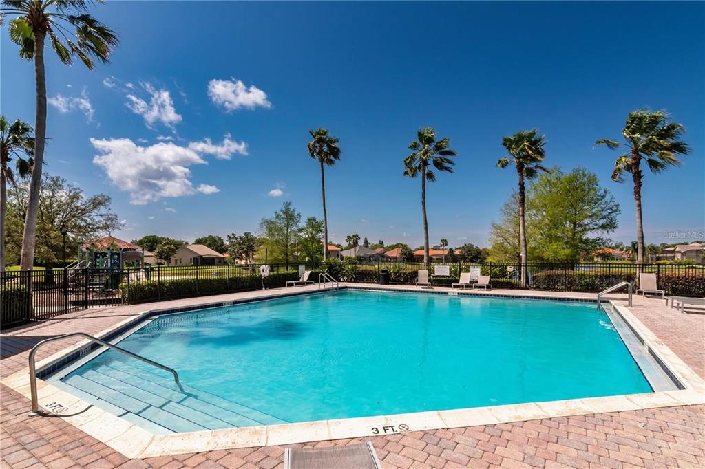 11531 Vicolo Loop Windermere, FL 34786 - Photo 22 of 32 a view of a swimming pool and a chairs