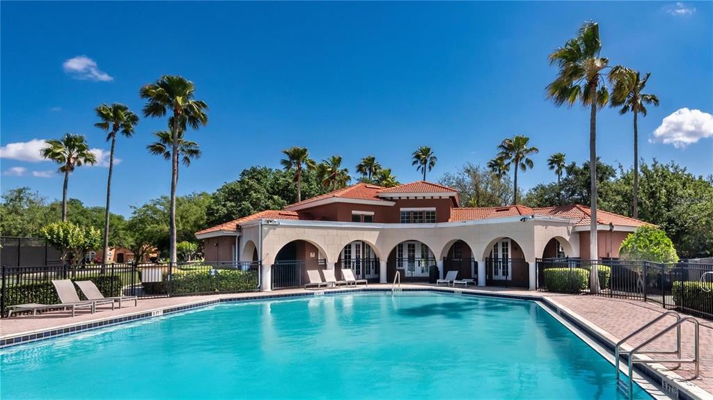 11531 Vicolo Loop Windermere, FL 34786 - Photo 23 of 32 a front view of a house with garden space and swimming pool