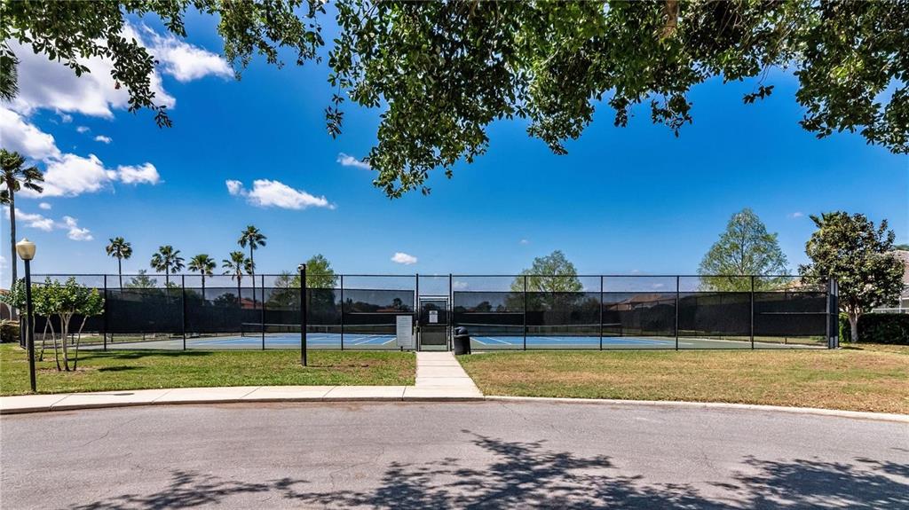 11531 Vicolo Loop Windermere, FL 34786 - Photo 28 of 32 a view of a swimming pool with an outdoor space and seating area