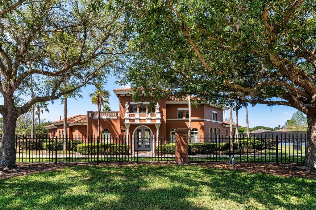 11531 Vicolo Loop Windermere, FL 34786 - Photo 29 of 32 a front view of a house with a yard