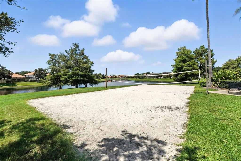 11531 Vicolo Loop Windermere, FL 34786 - Photo 31 of 32 a view of a lake with houses in the back