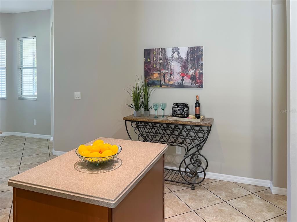 11531 Vicolo Loop Windermere, FL 34786 - Photo 5 of 32 a view of table and chair