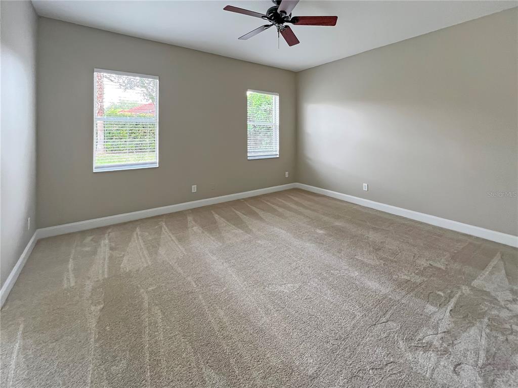 11531 Vicolo Loop Windermere, FL 34786 - Photo 8 of 32 a view of empty room with windows