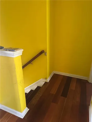 a view of a big room with wooden floor