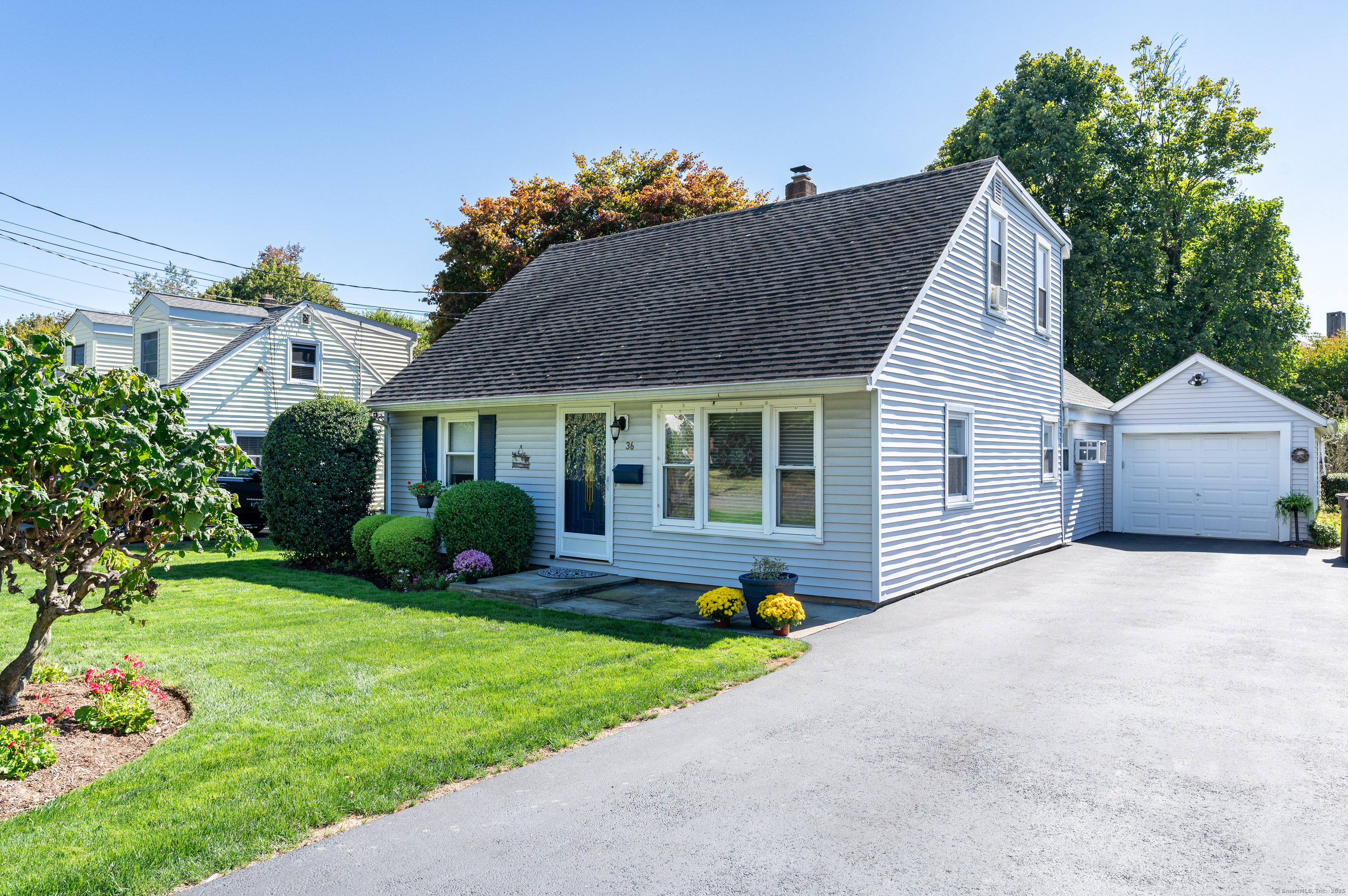 36 Old Barn Road South Stamford, CT 06905 - Photo 1 of 1 a front view of house with yard and green space