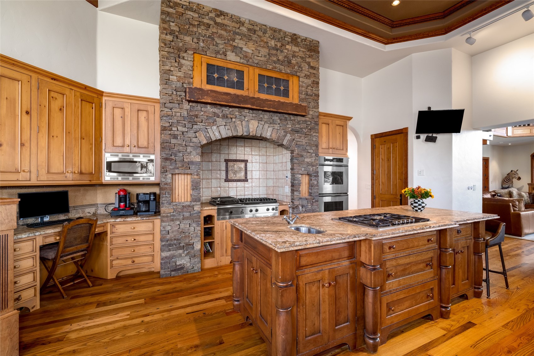 35415 Priest Creek Road Steamboat Springs, CO 80487 - Photo 12 of 50 a kitchen that has a stove and a microwave