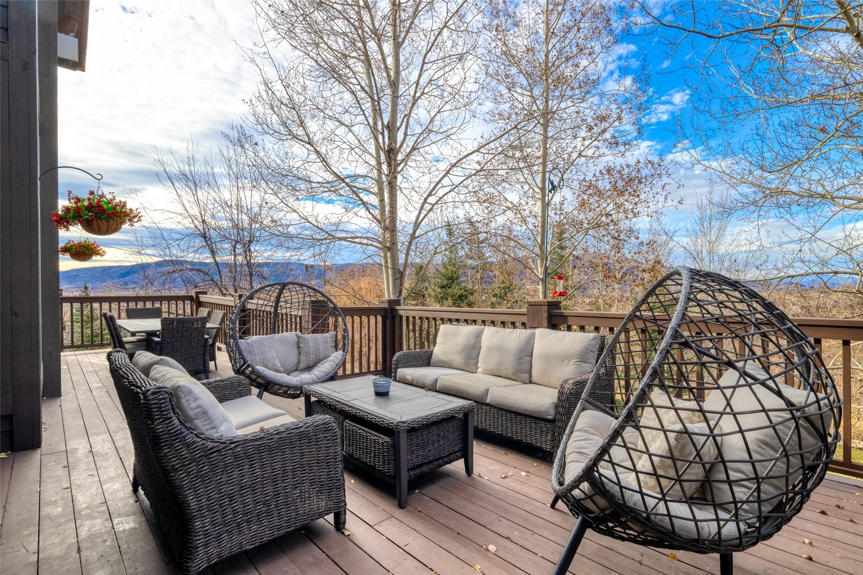 35415 Priest Creek Road Steamboat Springs, CO 80487 - Photo 14 of 50 a balcony with couple of chairs and a couch