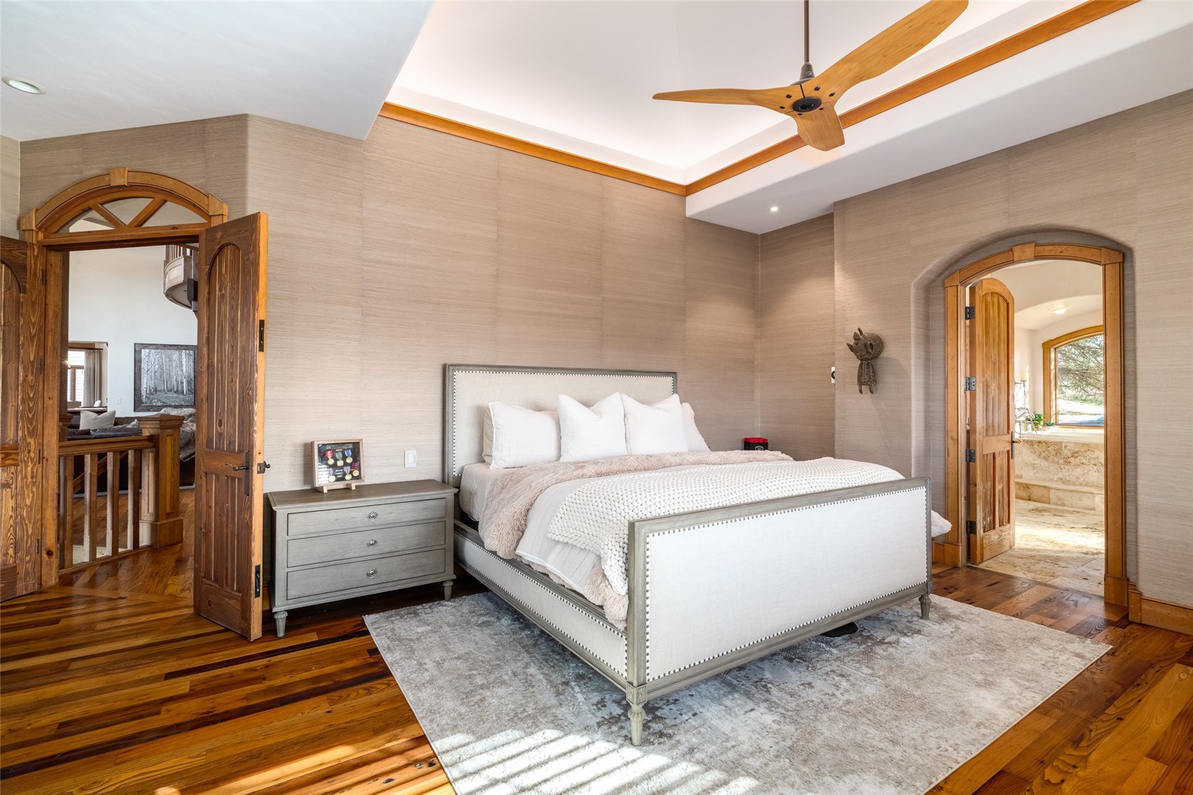 35415 Priest Creek Road Steamboat Springs, CO 80487 - Photo 21 of 50 a bed sitting in a bedroom next to a window