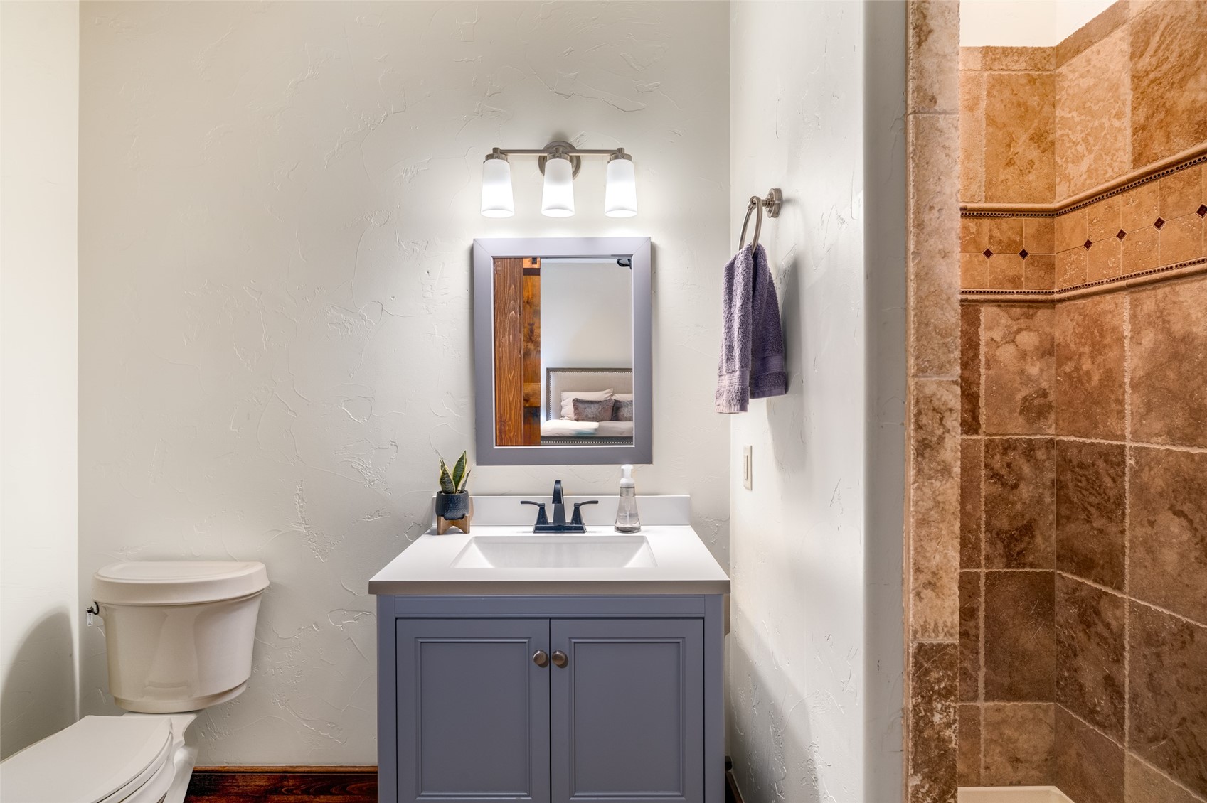35415 Priest Creek Road Steamboat Springs, CO 80487 - Photo 43 of 50 a bathroom with a sink a toilet and shower