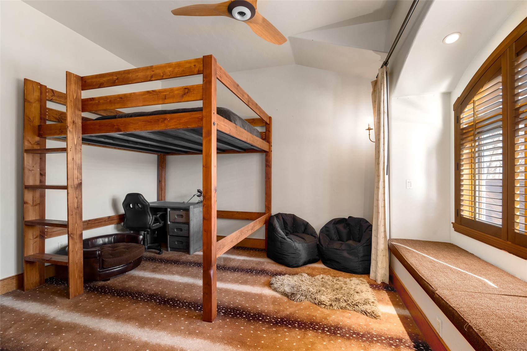 35415 Priest Creek Road Steamboat Springs, CO 80487 - Photo 46 of 50 a bedroom with a bed and a window