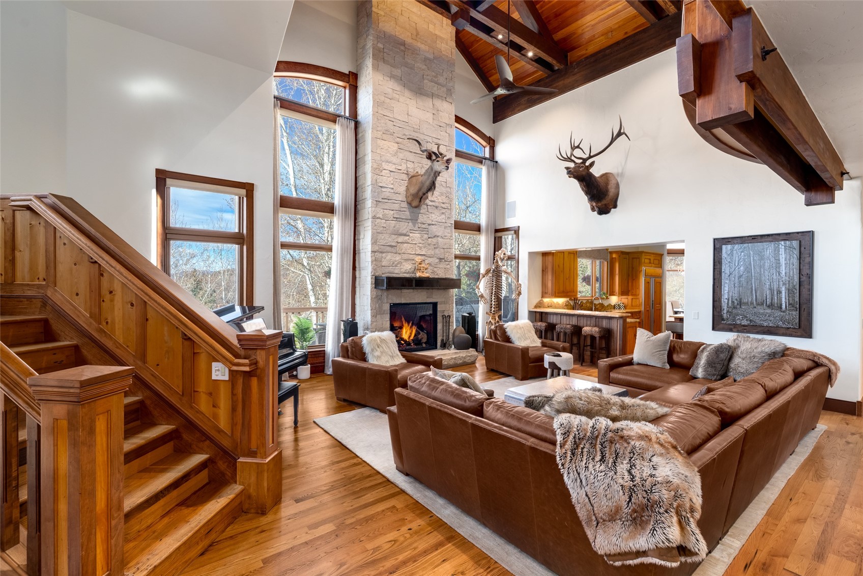 35415 Priest Creek Road Steamboat Springs, CO 80487 - Photo 7 of 50 a living room with fireplace furniture and a window