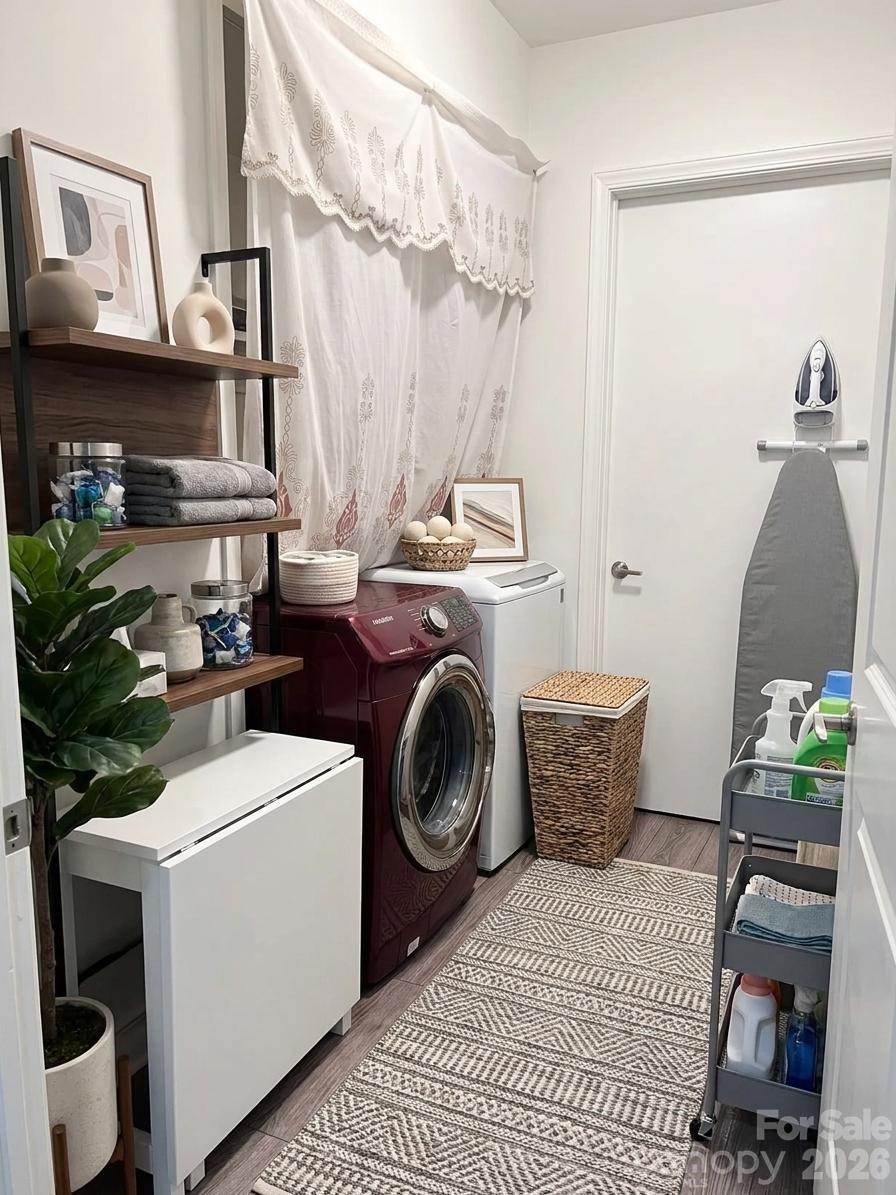 2545 Cedarwild Road Charlotte, NC 28212 - Photo 19 of 25 a utility room with dryer and washer