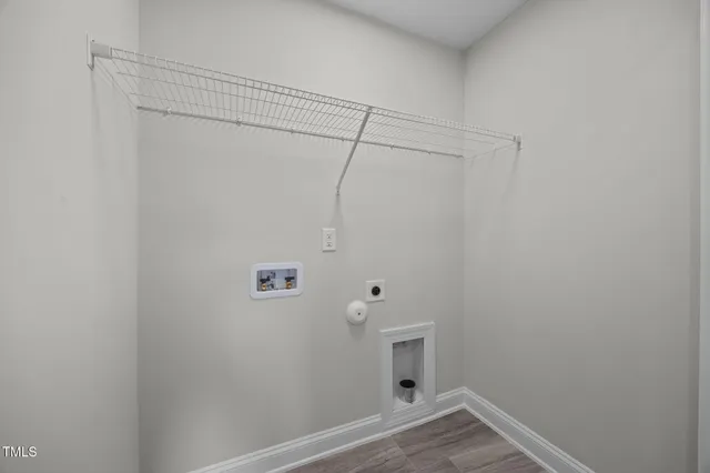 a view of balcony with wooden floor