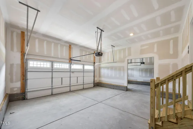 a view of a livingroom with furniture and a window