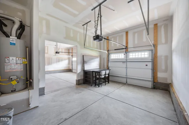 a front view of house with yard and swimming pool