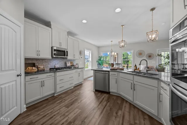 a view of a dining room and chandelier