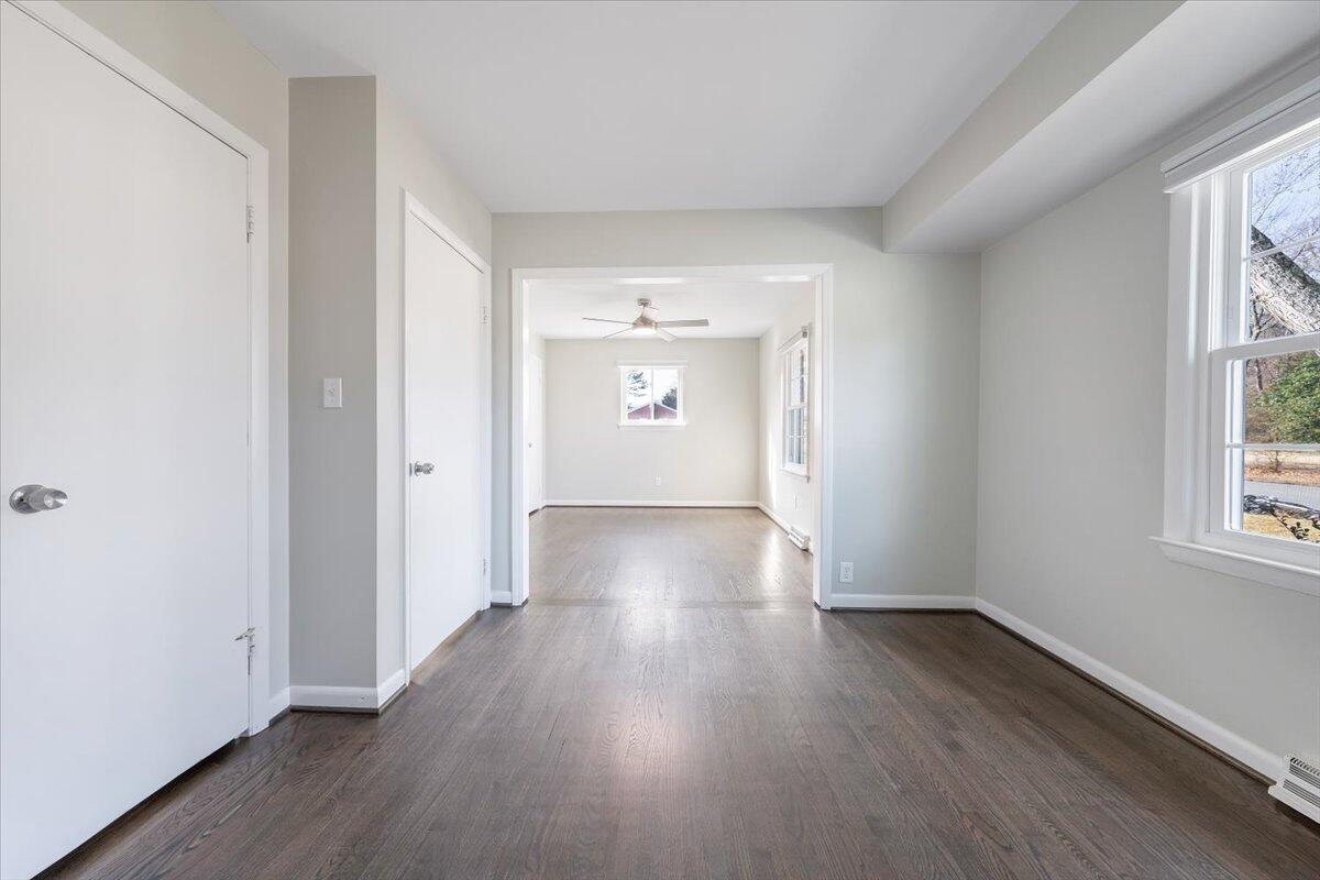 3804 Meadowlark Road Roanoke, VA 24018 - Photo 16 of 54 an empty room with wooden floor and windows