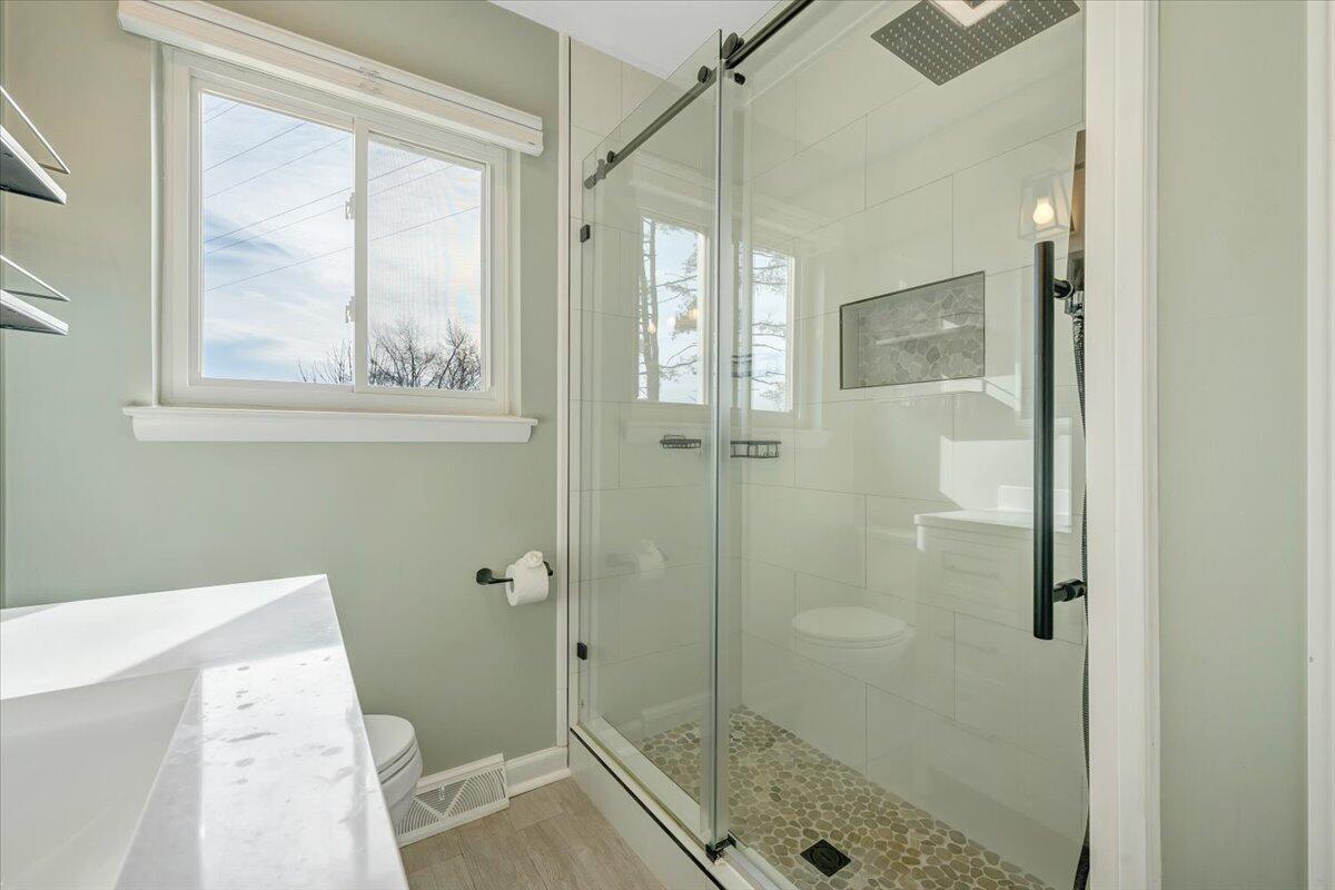 3804 Meadowlark Road Roanoke, VA 24018 - Photo 19 of 54 a bathroom with a shower and toilet