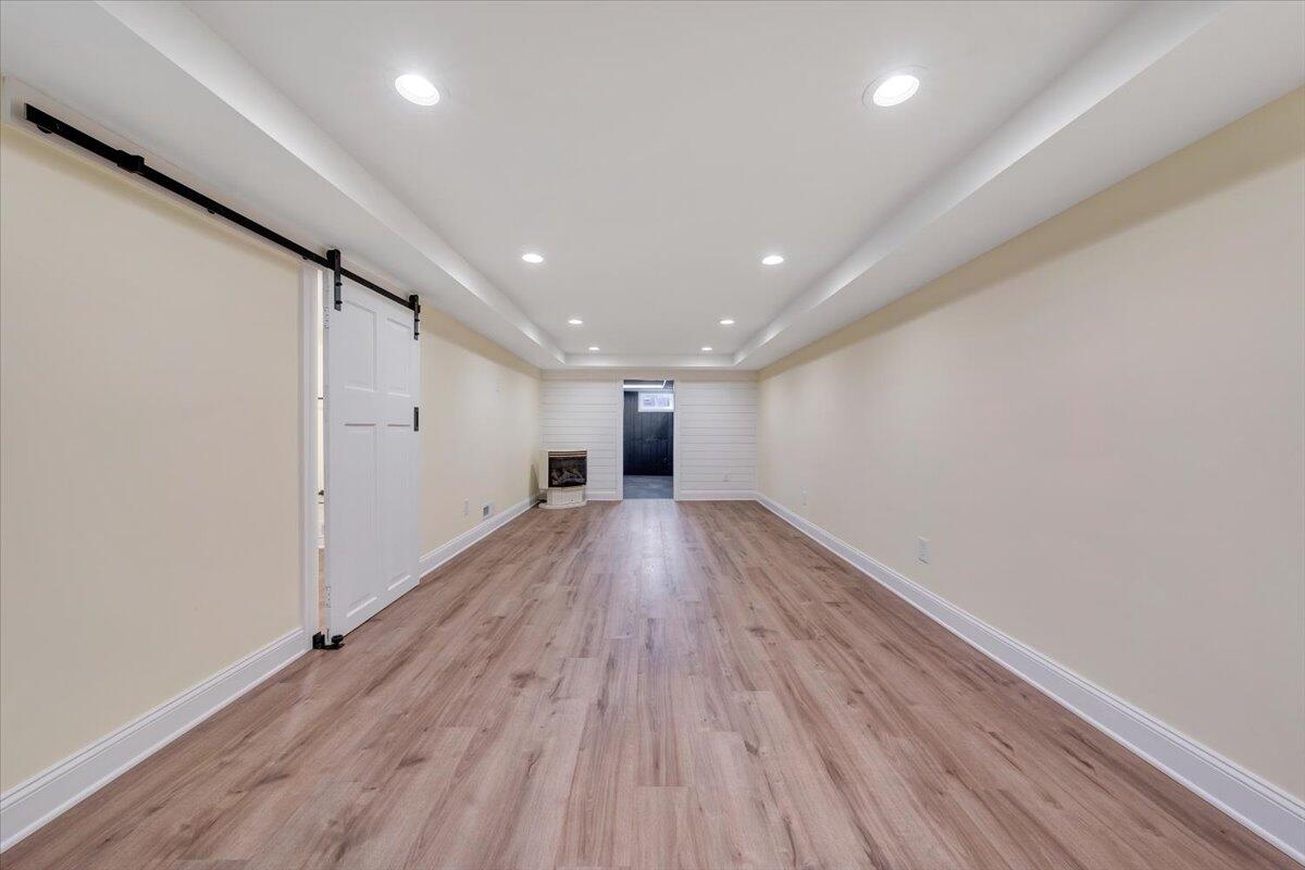 3804 Meadowlark Road Roanoke, VA 24018 - Photo 24 of 54 a view of empty room with wooden floor