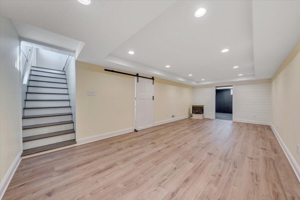 3804 Meadowlark Road Roanoke, VA 24018 - Photo 25 of 54 an empty room with wooden floor and windows