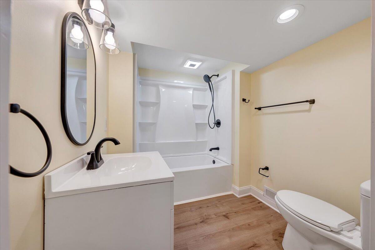 3804 Meadowlark Road Roanoke, VA 24018 - Photo 30 of 54 a bathroom with a sink a toilet and shower