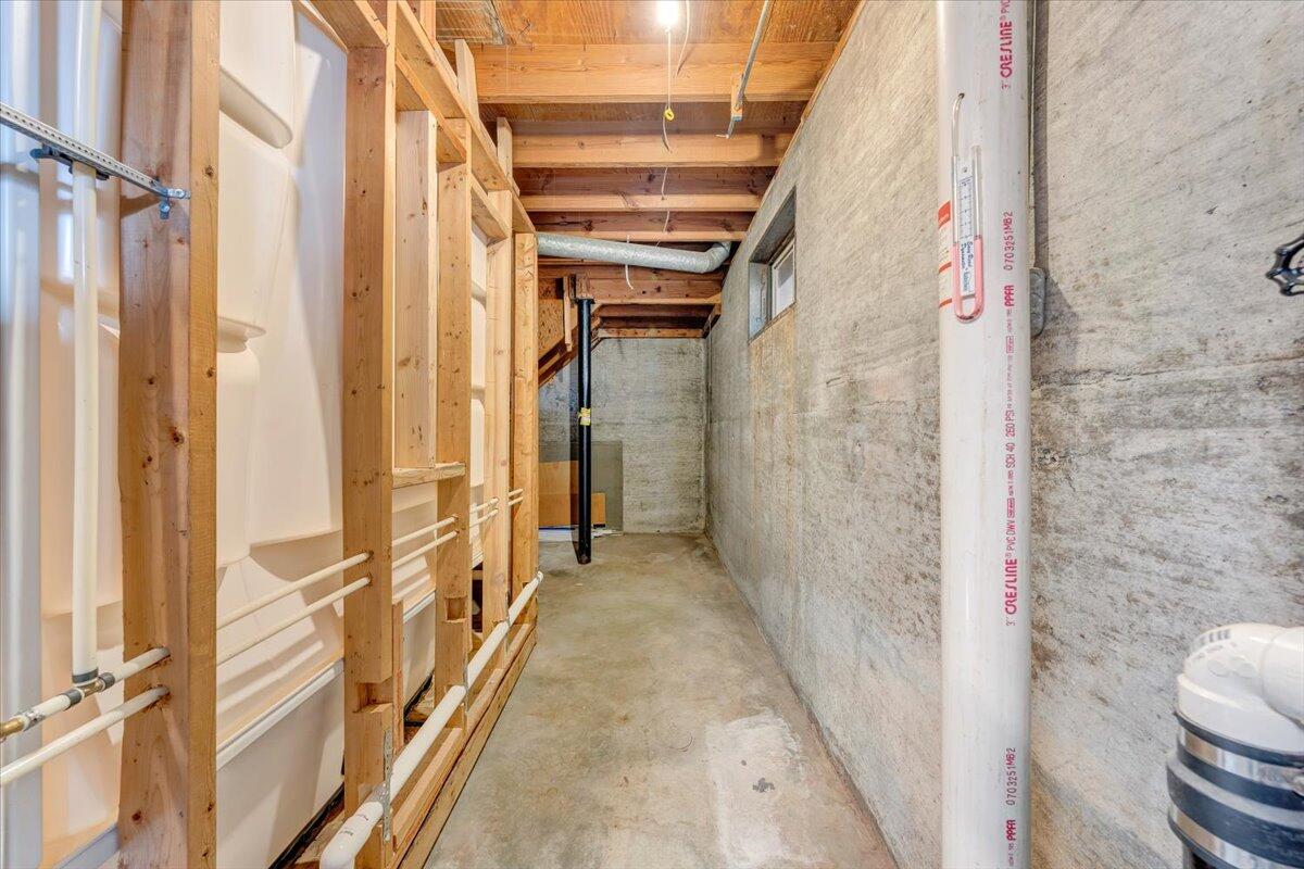3804 Meadowlark Road Roanoke, VA 24018 - Photo 33 of 54 a view of a hallway with wooden floor and staircase