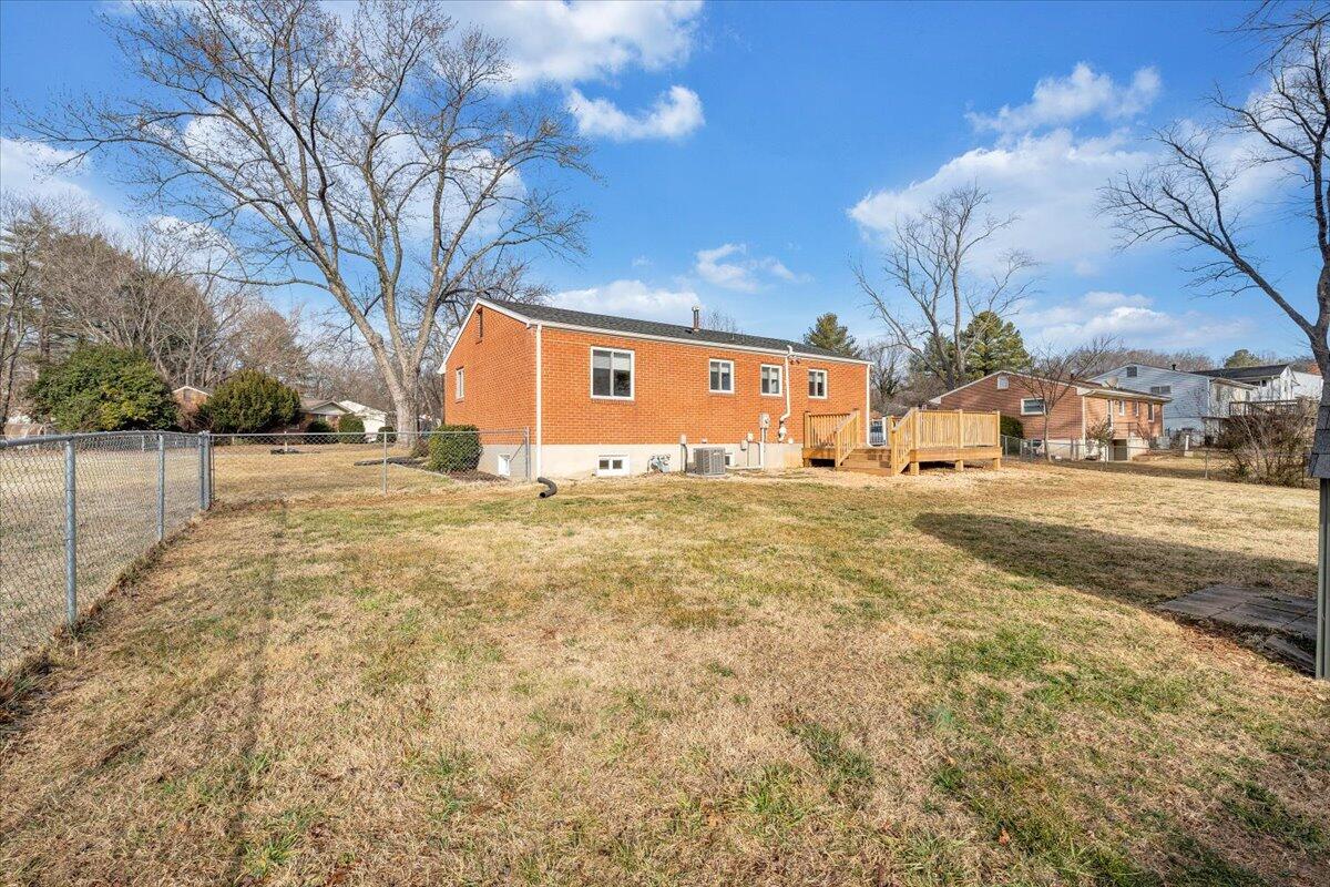 3804 Meadowlark Road Roanoke, VA 24018 - Photo 43 of 54 a backyard of a house with large trees