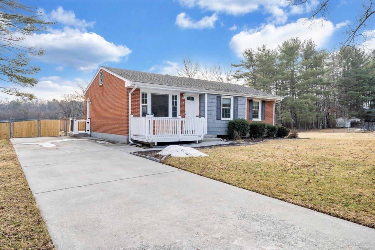 3804 Meadowlark Road Roanoke, VA 24018 - Photo 48 of 54 a front view of house with yard and trees around