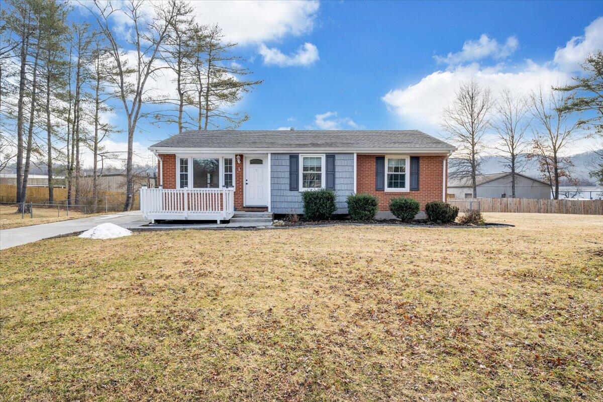 3804 Meadowlark Road Roanoke, VA 24018 - Photo 51 of 54 a front view of a house with a yard and trees