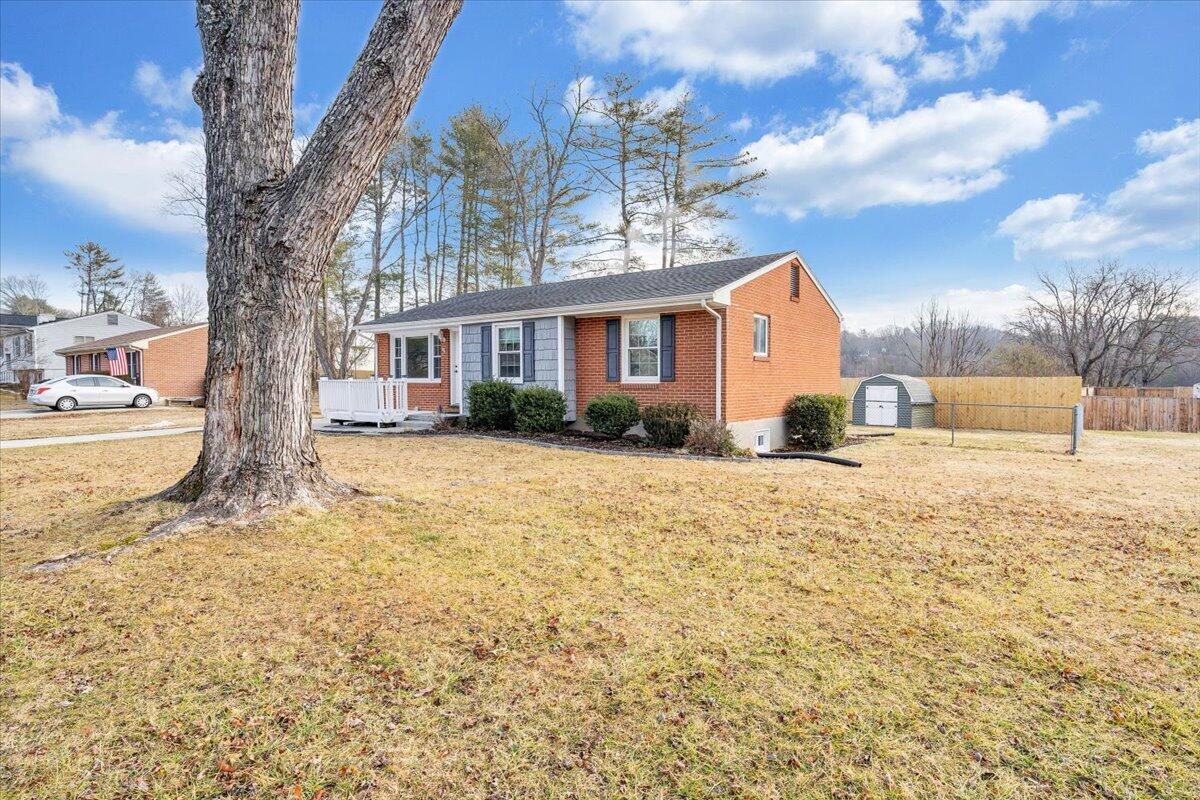 3804 Meadowlark Road Roanoke, VA 24018 - Photo 53 of 54 a view of a house with a yard covered in snow