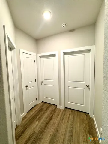 a bathroom with a double vanity sink toilet a mirror and shower