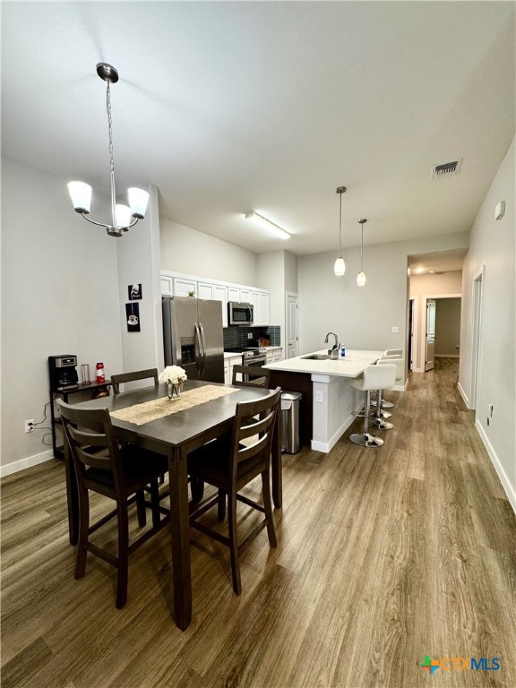 4022 Keller Road, Unit B Temple, TX 76504 - Photo 9 of 34 a kitchen with a table and chairs in it