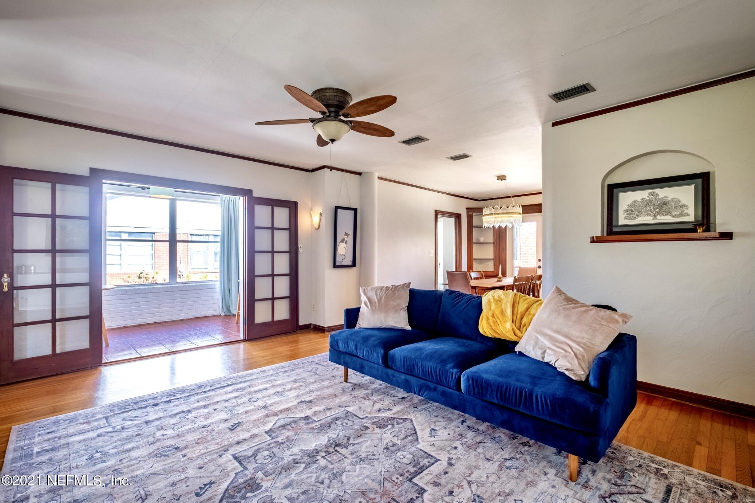 3965 Gadsden Road Jacksonville, FL 32207 - Photo 9 of 38 a living room with furniture and wooden floor