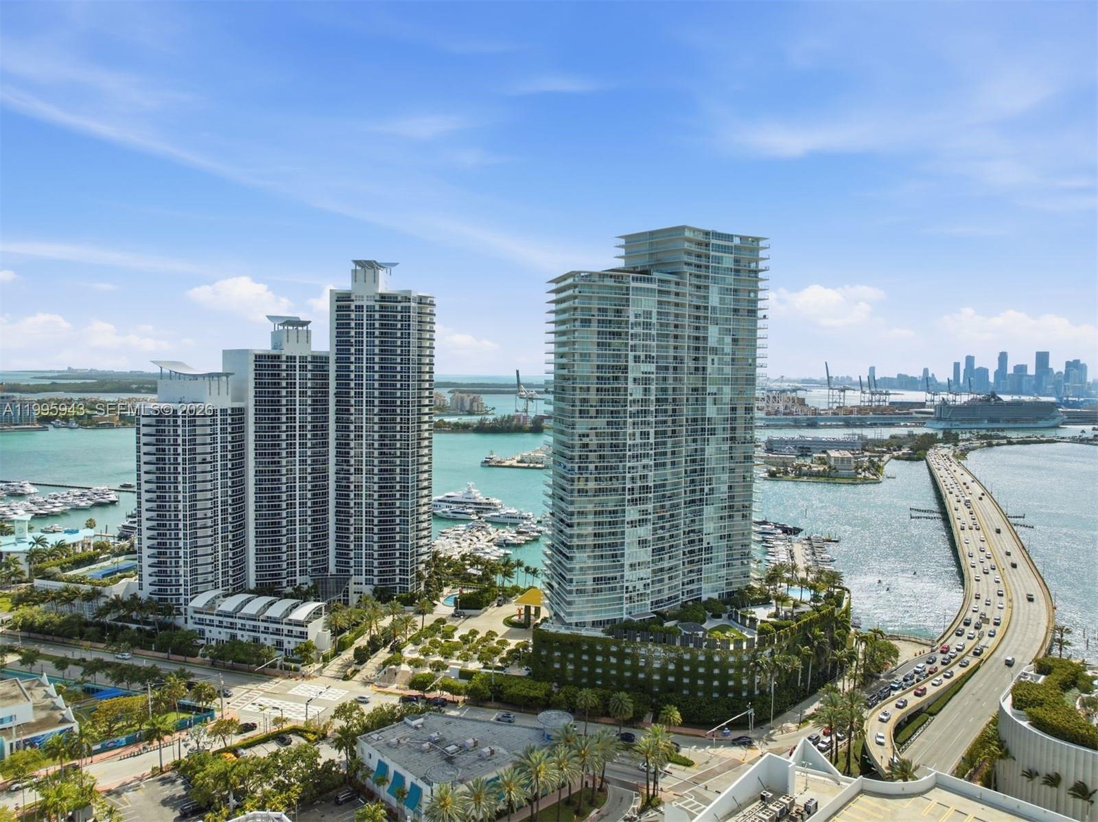 450 Alton Road, Unit 910 Miami Beach, FL 33139 - Photo 44 of 59 a view of a city with tall buildings
