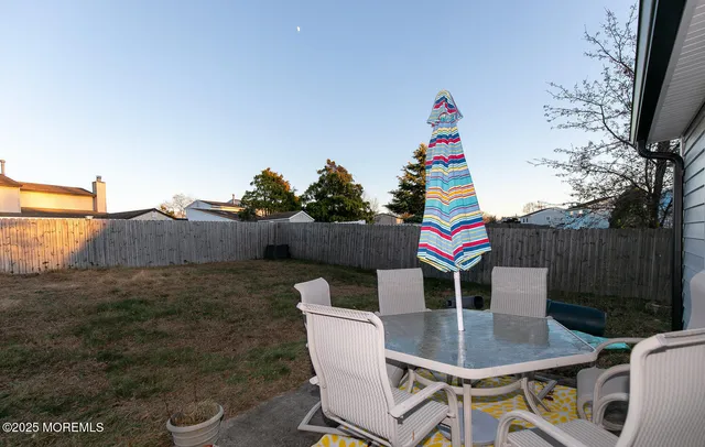 a view of a terrace with sitting area