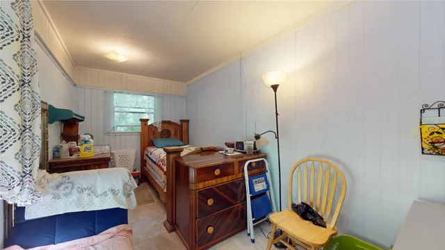 a room with furniture and a window