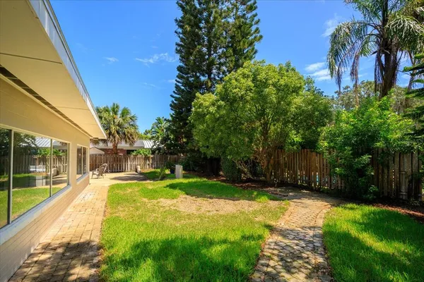 a view of a backyard with a garden