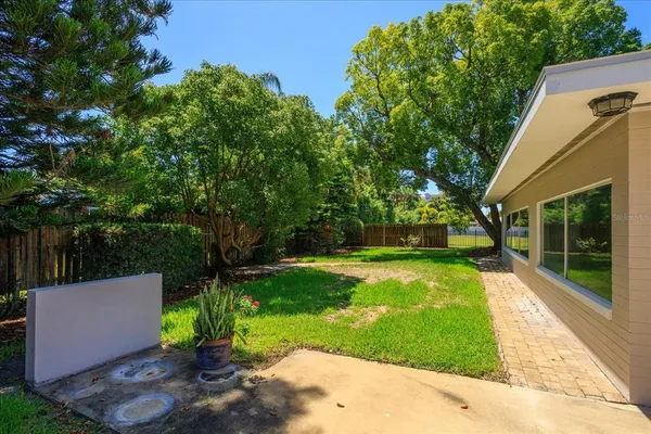 a view of a backyard with a garden