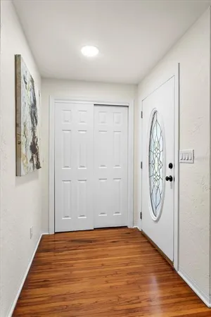 a view of a livingroom with an entryway